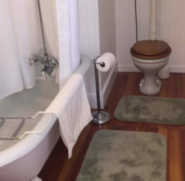 Claw foot tub, and high tank toilet